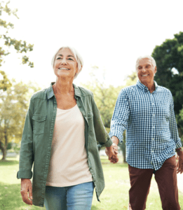 Shot of a happy senior couple going for a walk in the park